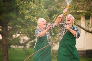 Old Couple playing with Water