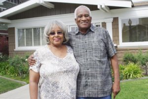 an elderly couple consider their senior living options